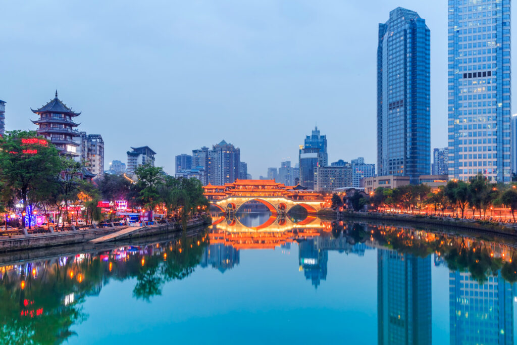 A panoramic view of Shenzhen City, China, showcasing modern skyscrapers and the bustling urban landscape beneath a clear sky