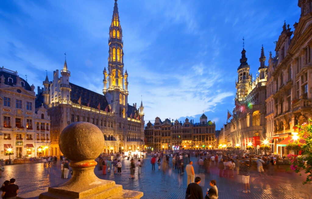 Vibrant nightlife in Brussels, featuring illuminated bars and bustling streets