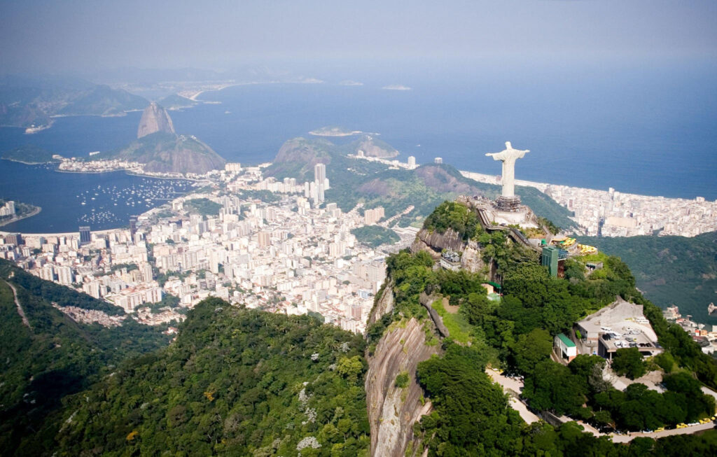 A stunning view of Rio de Janeiro with the skyline, beaches, and Christ the Redeemer in the background
