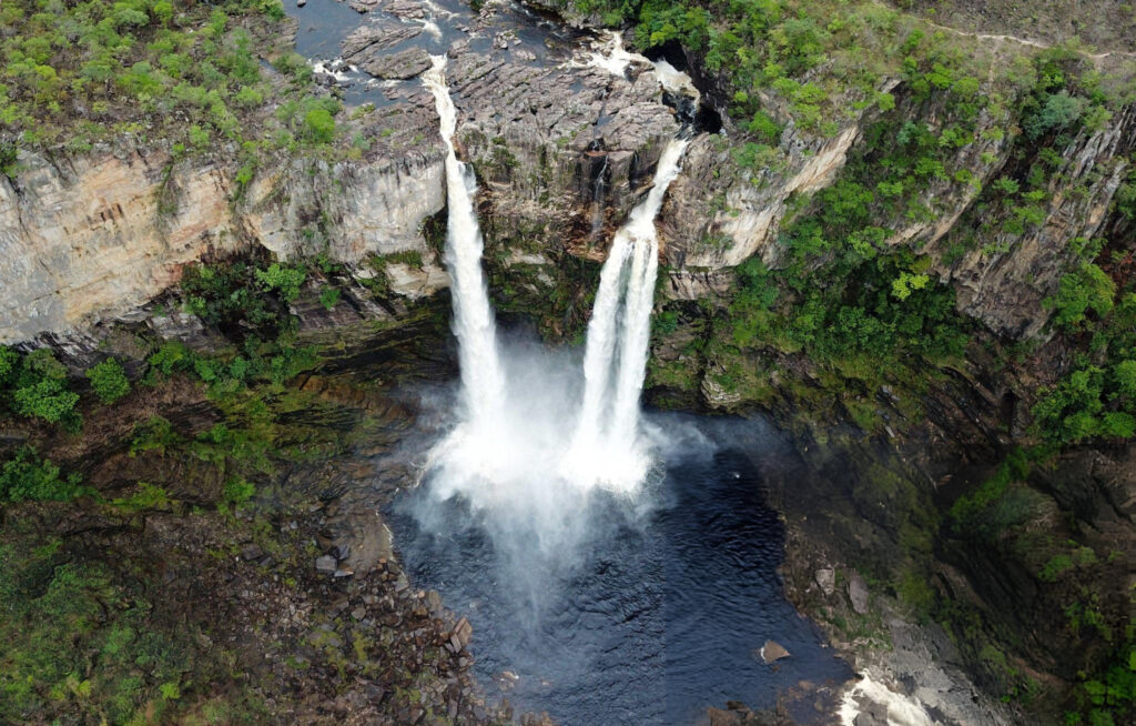 Datanla Waterfall in Dalat, Vietnam, cascading down rocks surrounded by lush greenery and tropical forest