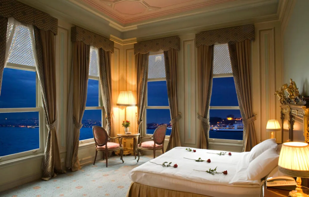 A luxurious hotel room in Istanbul, Turkey, featuring elegant decor, a comfortable bed, and a view of the city’s skyline or historic landmarks