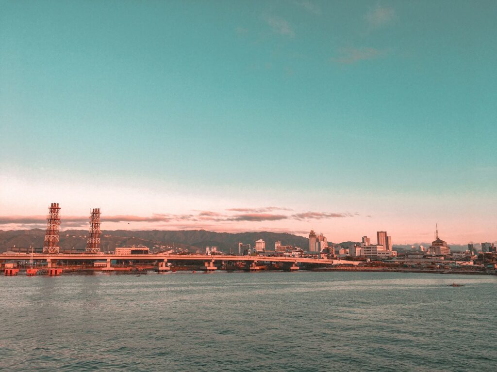 Panoramic view of Cebu City skyline with skyscrapers and hills in the background