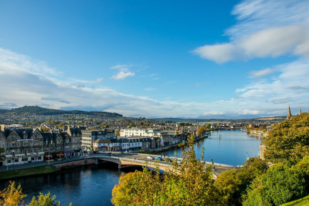 Inverness city in Scotland with a view of the River Ness flowing through the city