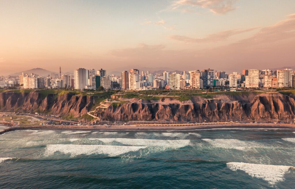 Beach in Lima, Peru with high-rise buildings along the shoreline