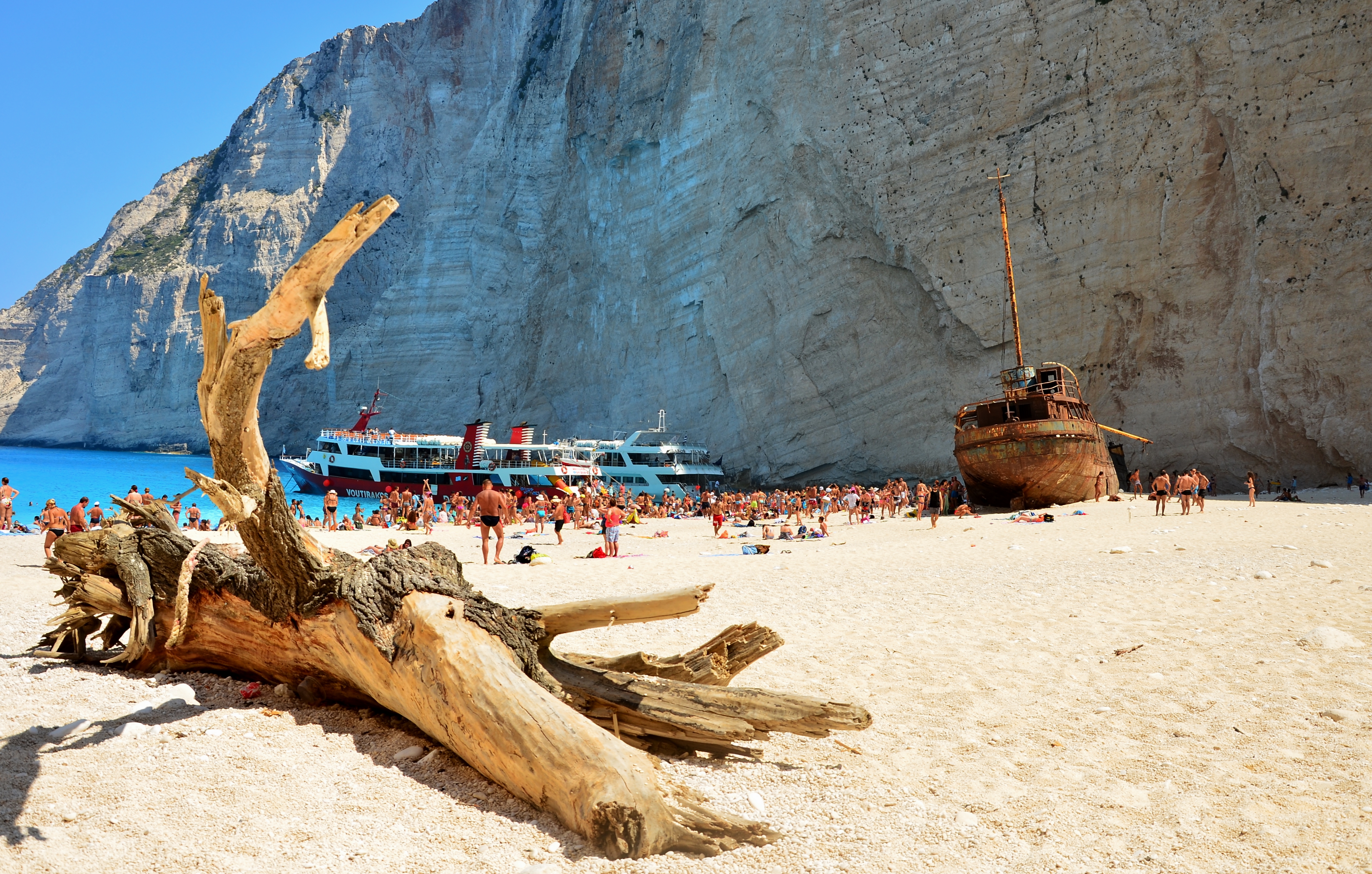Shipwreck on Navagio Beach, Zakynthos, Greece, surrounded by white cliffs and turquoise waters