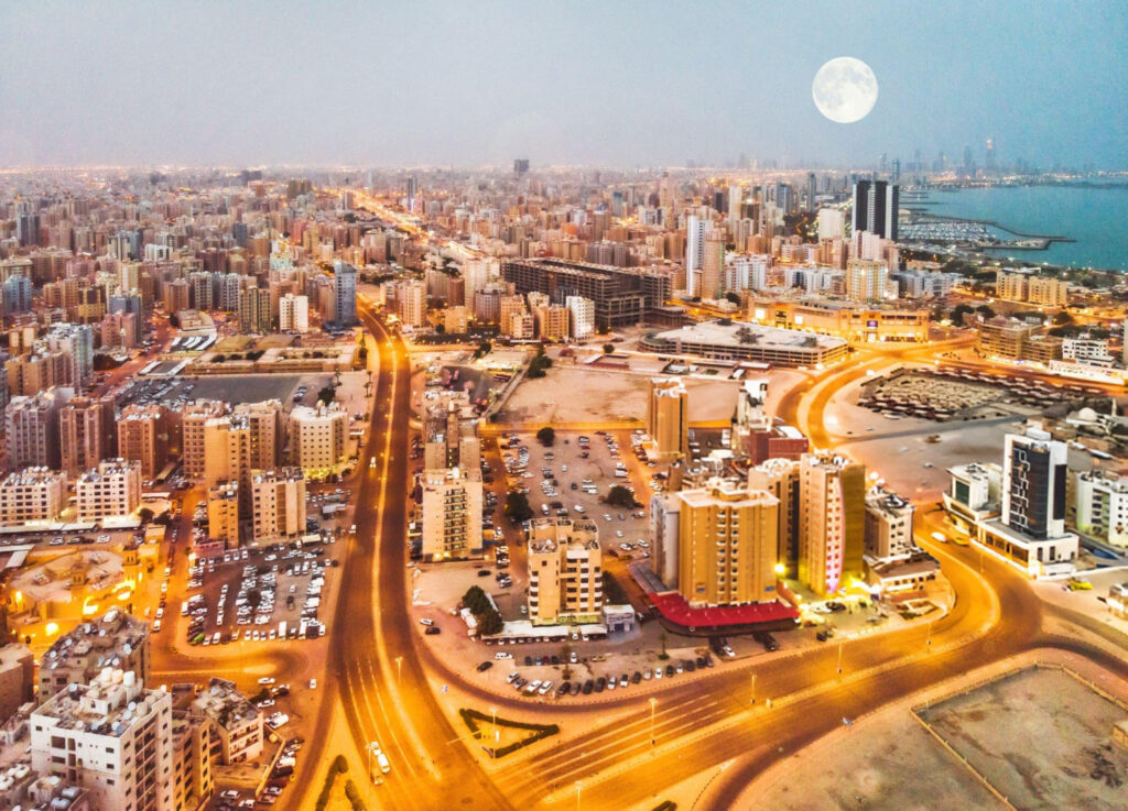 Salmiya City coastline with modern buildings and Marina Crescent along the Arabian Gulf.
