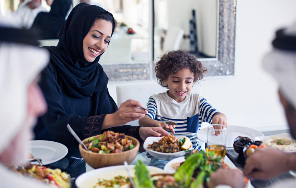 Traditional Saudi dishes served at a restaurant in Jeddah, including kabsa and samboosa.