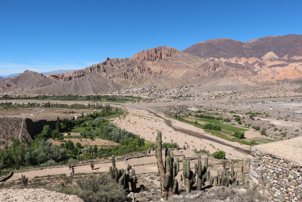 Stunning landscape of Quebrada de Humahuaca with colorful mountains and traditional adobe villages