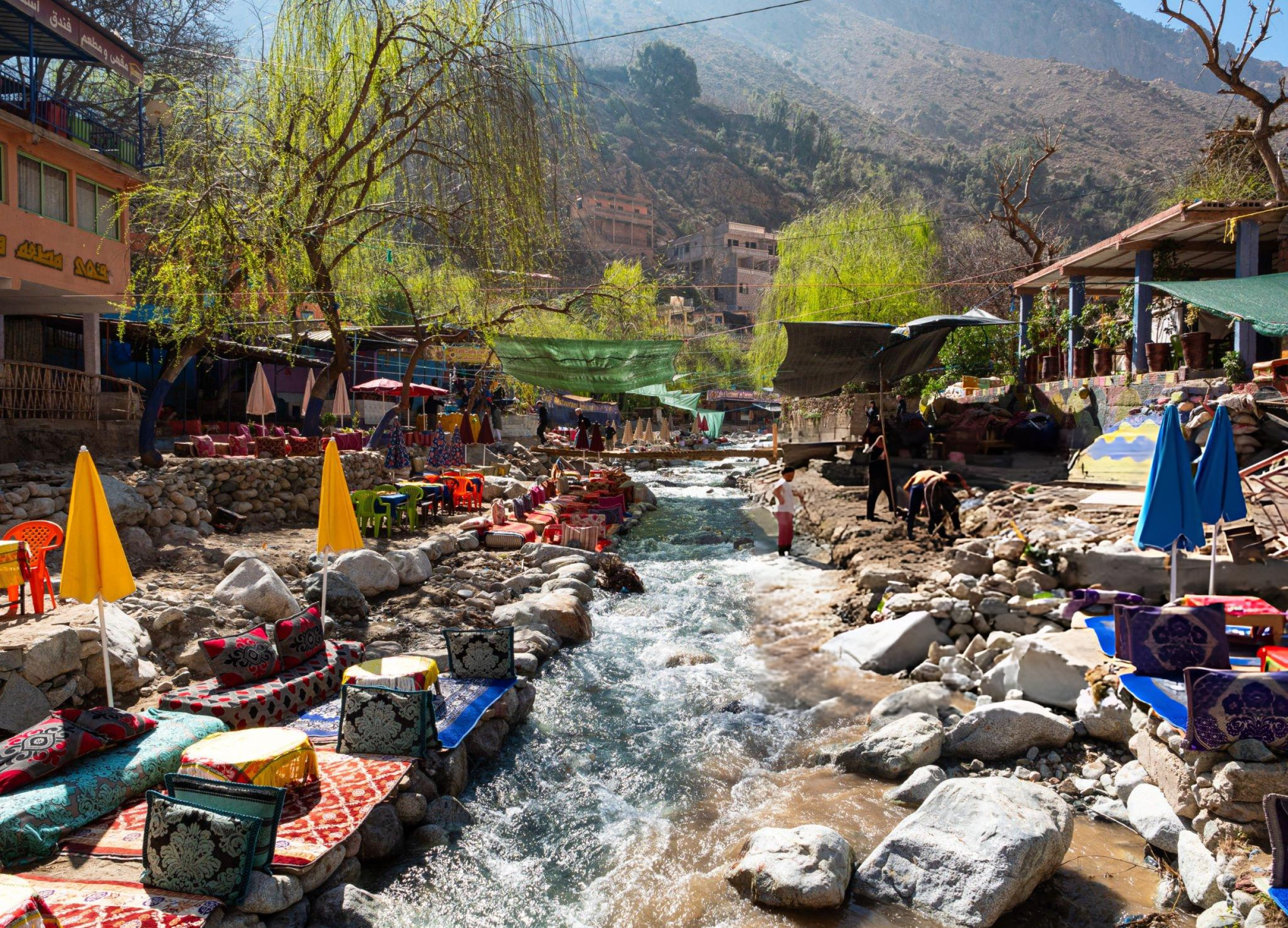 A serene river flowing through the center of Ourika Valley, surrounded by lush greenery and mountain landscapes in Morocco